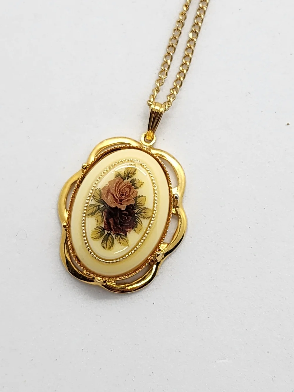 Vintage Gold Tone Floral Oval Pendant Necklace